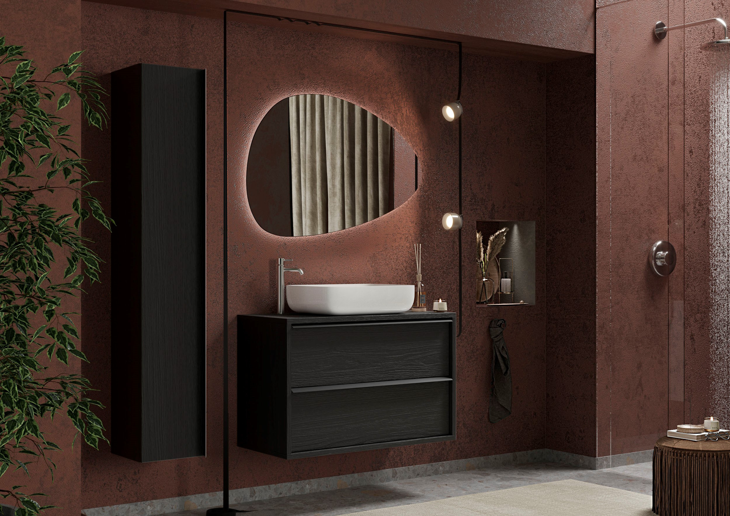 Tocador de baño negro con lavabo dorado y un espejo grande